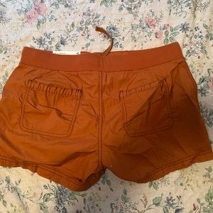 Brand new with tag, rust color shorts
